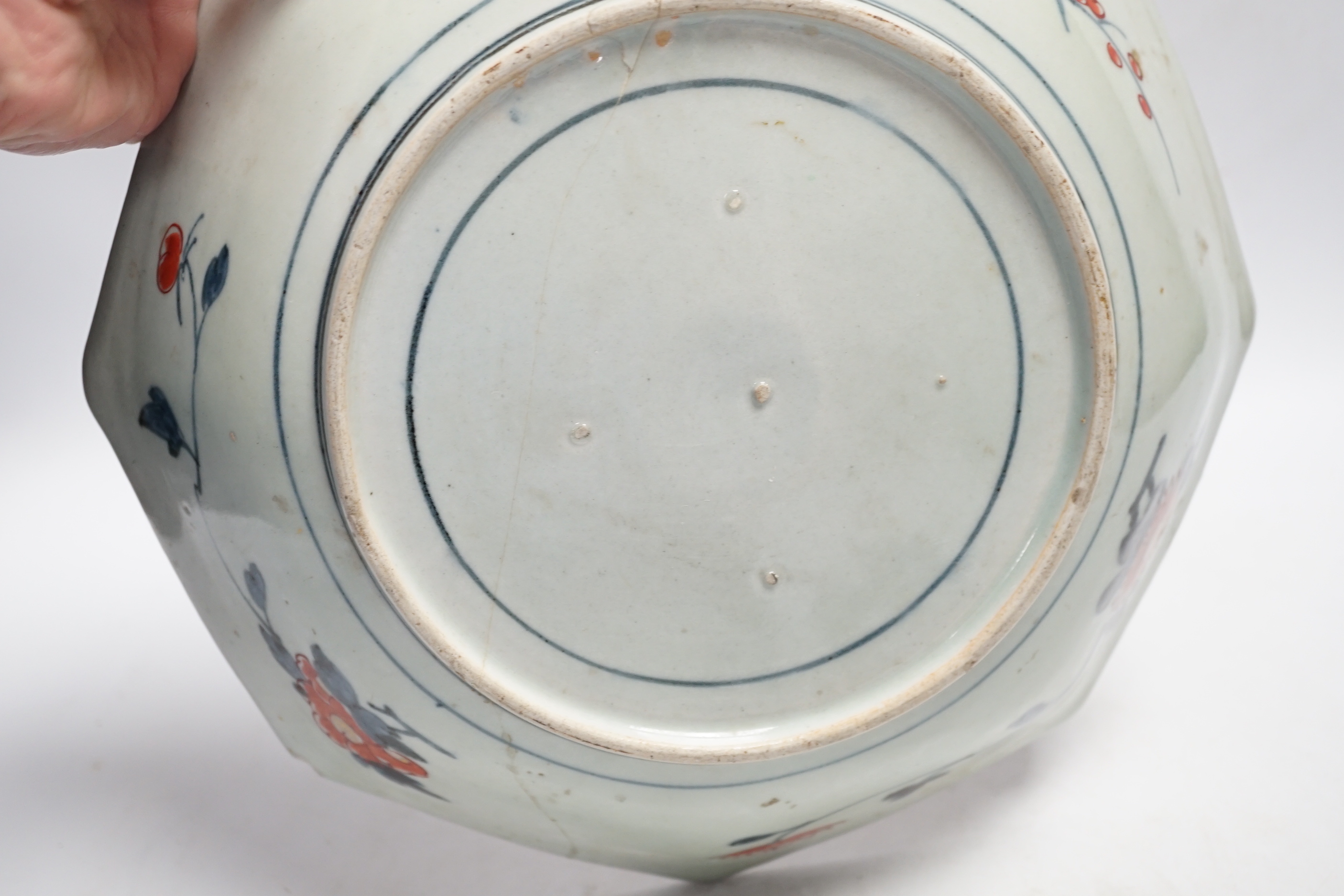 A late 17th/early 18th century Japanese Arita dish (a.f) and two other Arita pieces, largest 27cm